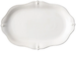 The Juliska Berry & Thread Whitewash 16" Platter features an oval ceramic shape with a scalloped edge and subtle detailing, perfect for enhancing your dinnerware collection.