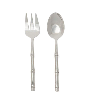 The Liliana Polished Silver Bamboo Serving Set by Blue Pheasant, featuring a fork and spoon with bamboo-inspired handles, brings island flair to your table.