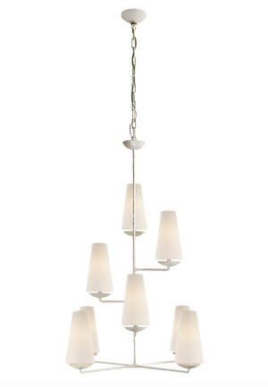 The Fontaine Vertical Chandelier by Visual Comfort features two tiers and seven linen lampshades, gracefully hanging from a chain with elegant candelabra sockets.
