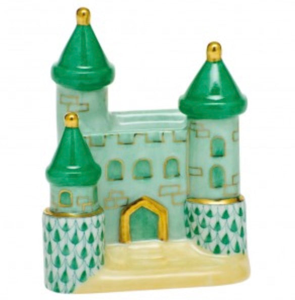 The Herend Castle by Herend is a small decorative ceramic castle with green roofs, gold accents, and patterned lower towers, featuring hand-painted designs for artistic appeal.