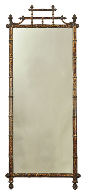 The Horner Bamboo Mirror, Tortoise by Carver's Guild, features an ornate dark wooden frame with exquisite bamboo detailing. It's the ideal choice for bamboo-style aficionados and is available at our New York furniture store.