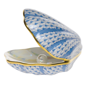 The Herend Oyster with Pearl, Blue features an open blue and white shell with gold trim and a pearl inside—a hand painted porcelain piece perfect for display.