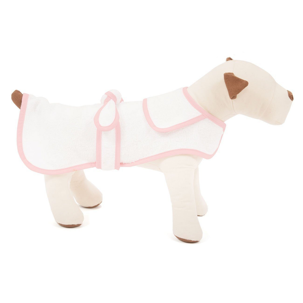 A white pup dressed in a Pink Terry Cloth Dog Robe, X-Small by Harry Barker and enjoying a spa treatment.