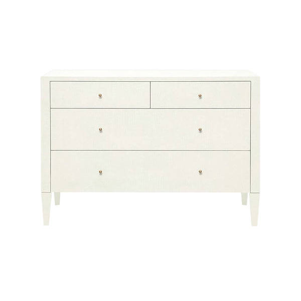 A Pristine White Four Drawer Dresser by Made Goods with drawers on a white background. The dresser is made of raffia-like resin, giving it a unique texture.