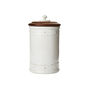 The Juliska Berry & Thread Whitewash 10" Canister features a white ceramic stoneware basket weave design and an ash wood lid, shown against a plain white background.
