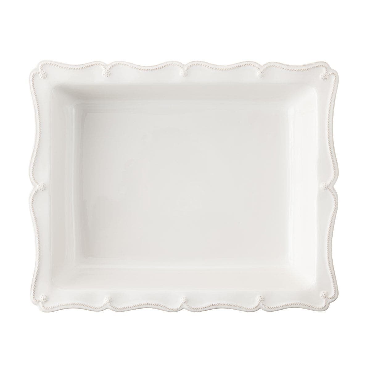 The Juliska Berry & Thread Whitewash 17.5" Rectangular Baker features scalloped, beaded edges—ideal for serving holiday recipes and shown from above on a white background.
