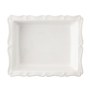 The Juliska Berry & Thread Whitewash 17.5" Rectangular Baker features scalloped, beaded edges—ideal for serving holiday recipes and shown from above on a white background.