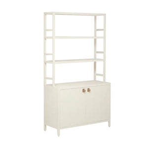The Jake Bookcase by Made Goods, crafted in white faux Belgian linen, features a tall design with two open shelves above a double-door storage cabinet.