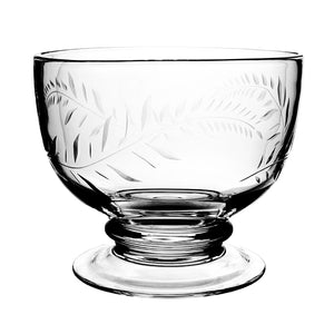 The Jasmine Footed Serving Bowl by William Yeoward Crystal features an etched leaf design, wide open top, and sturdy pedestal base—an elegant serving piece to enhance any buffet table. Displayed on a white background.