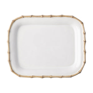 A Juliska Classic Bamboo Small Rectangular Platter with a bamboo rim, also known as a platter.