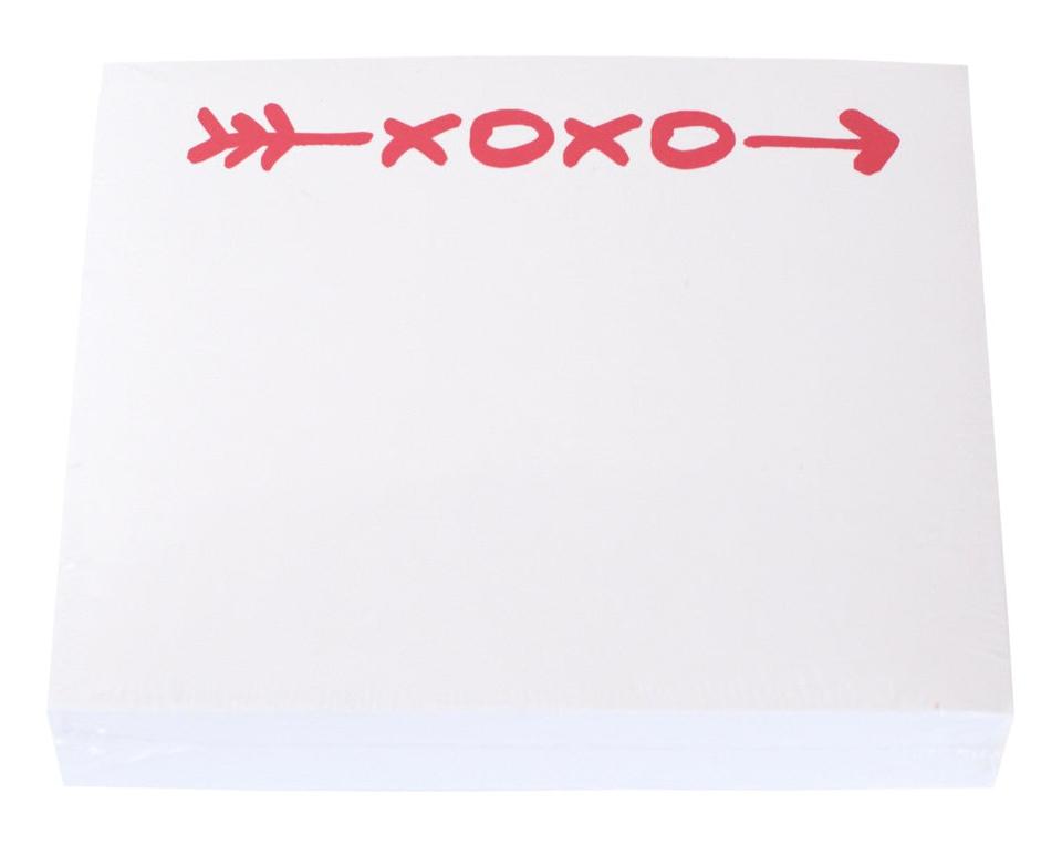 The XOXO Large Notepad by Black Ink features white pages with a red arrow and "XOXO" repeated at the top, set in a sleek Lucite Notepad Holder—perfect for everyday notes on quality paper.
