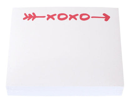 The XOXO Large Notepad by Black Ink features white pages with a red arrow and "XOXO" repeated at the top, set in a sleek Lucite Notepad Holder—perfect for everyday notes on quality paper.