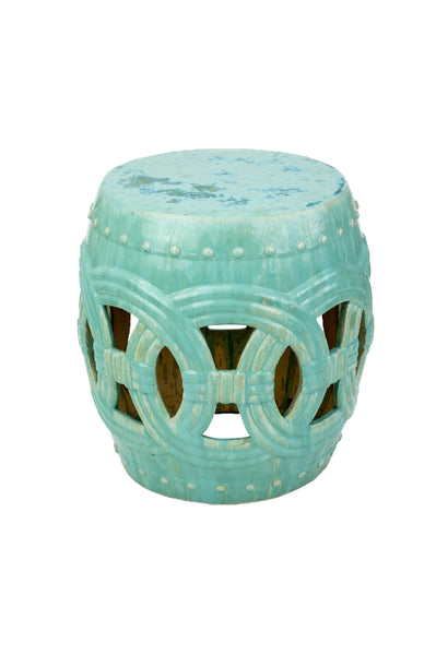A Large Circle Garden Stool, Turquoise by Van Cleve Collection with a pop of color on it.