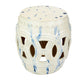 A Van Cleve Collection Large Circle Garden Stool in white and blue ceramic, perfect as additional seating and adding a pop of color to any space.