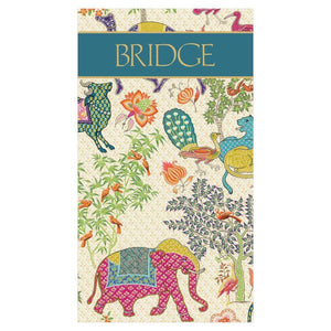 The Caspari Le Jardin De Mysore Bridge Score Pad (7.25" x 4.25") features vibrant animals and plants, a pink elephant, and "BRIDGE" in gold on a green banner—an eye-catching choice for your stationery collection.