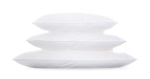 Three Matouk Libero Hypoallergenic Pillows, Queen size, are stacked atop each other against a plain white background.