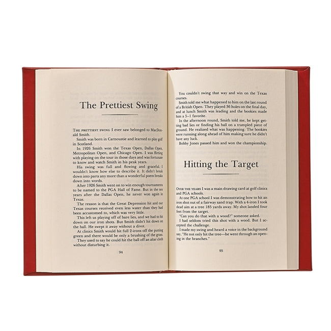 The open book, featuring a red cover like Harvey Penick’s Little Red Book by Graphic Image, displays pages 94 and 95. Titles such as "The Prettiest Swing" and "Hitting the Target" are visible, appealing to golf enthusiasts.