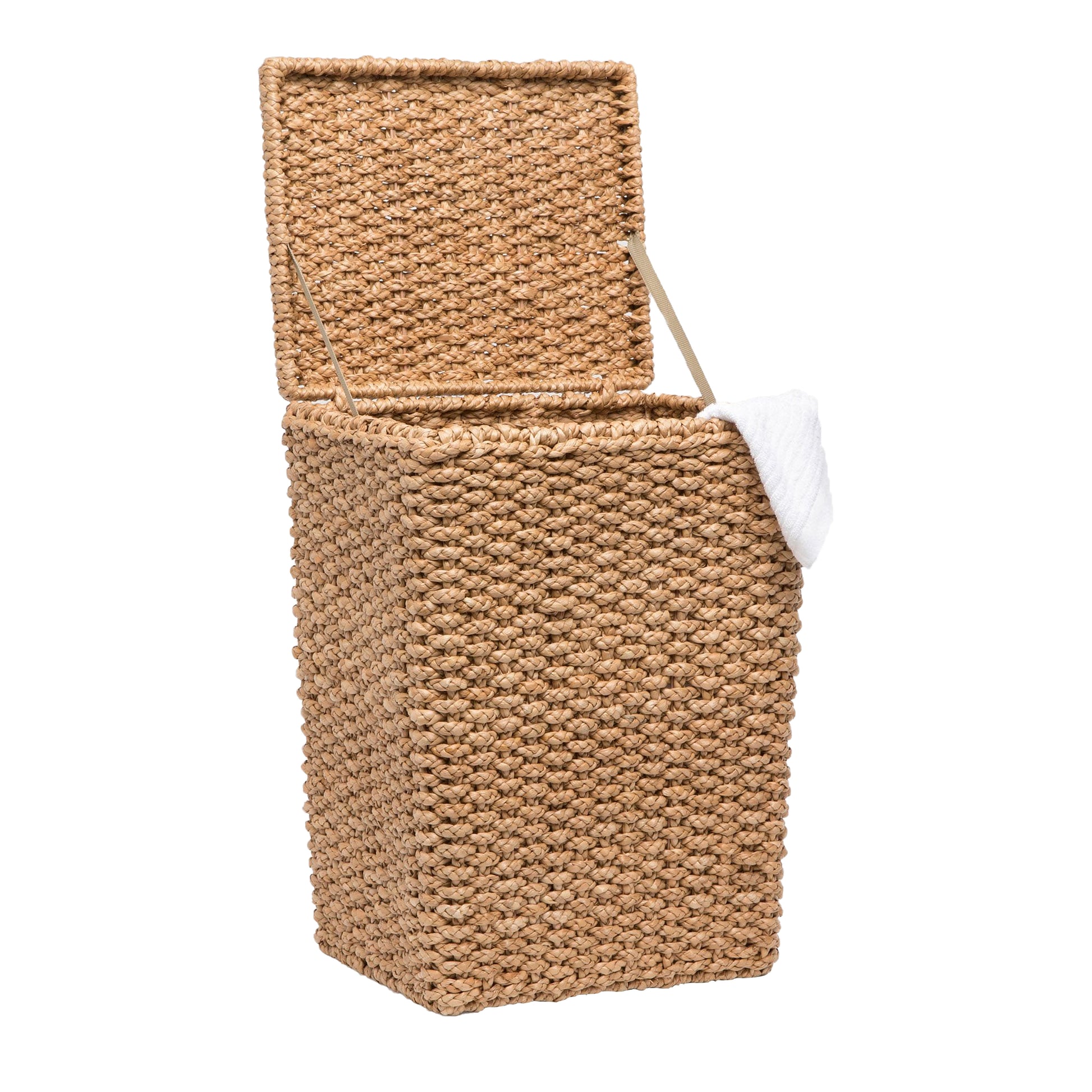 The Marennes Hamper by Pigeon & Poodle, with its woven seagrass design and open lid, displays a white towel draped over the edge.