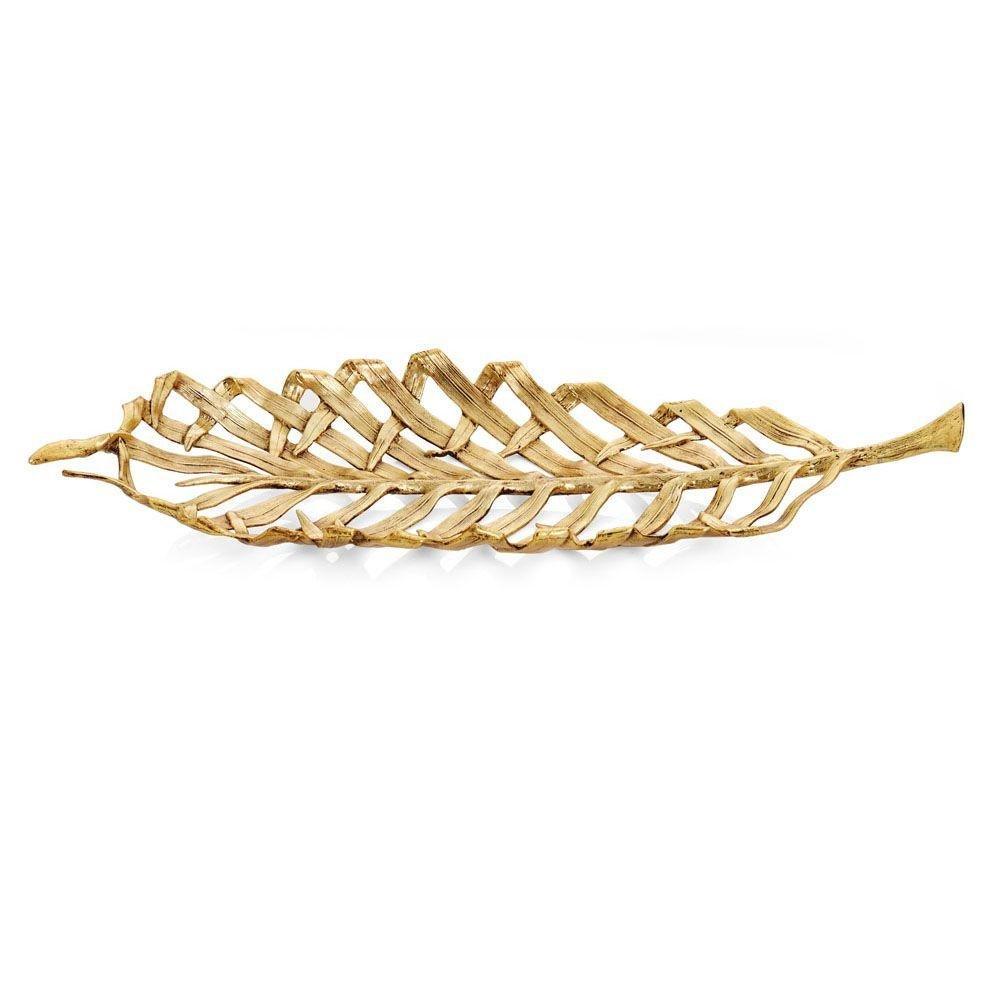 The Palm Centerpiece Platter by Michael Aram features an elongated leaf shape with sculpted textures and a lattice-style openwork design, all in a rich antique gold finish.