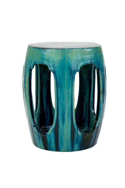 A versatile Ming Style Garden Stool, Green and Turquoise by Van Cleve Collection with a hole in the middle, perfect for adding a pop of color.