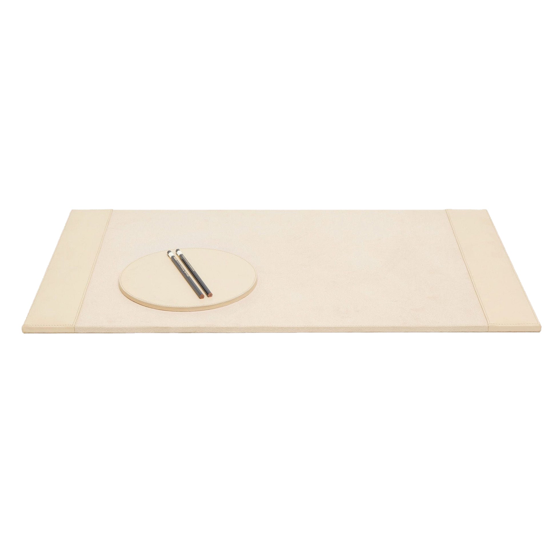 The Orsett Desk Blotter Set by Pigeon & Poodle is a beige, rectangular cream leather desk set with a round tray and two pens, all shown on a white background.