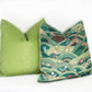 Two green Edgar Custom Drapery Rolling Hills Pillows on a white background.
