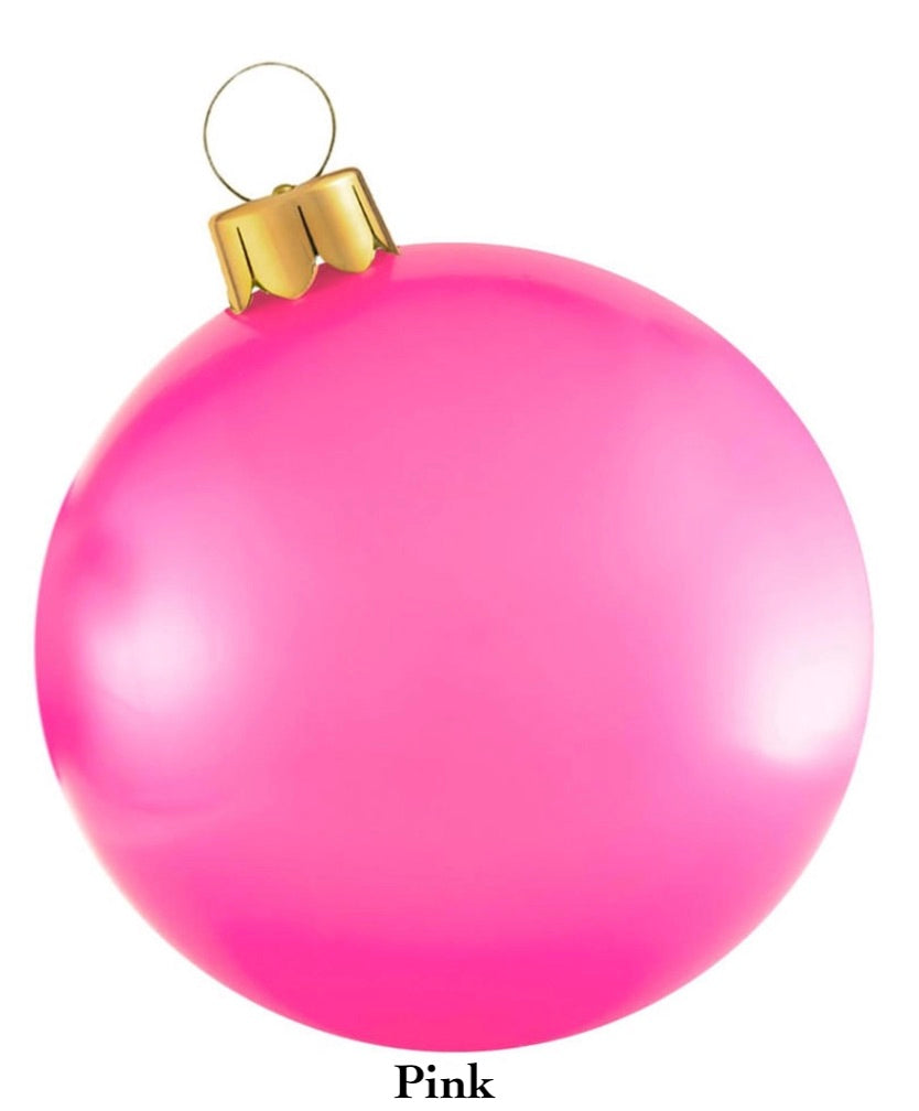 A Holiball Giant Inflatable Ornament, featuring a shiny pink finish and equipped with a gold cap and loop for hanging, adds a touch of elegance to your holiday decorations.