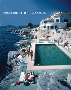 With "Poolside with Slim Aarons" by Abrams, a seaside villa featuring a rectangular pool embodies the glamorous lifestyle, allowing guests to indulge in sunbathing and swimming while admiring the stunning ocean view.