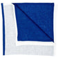 The Resort Two-Tone Napkin Set by Deborah Rhodes features square linen napkins with a blue center, white border, and a folded corner—perfect for adding vibrant color to your summer table.
