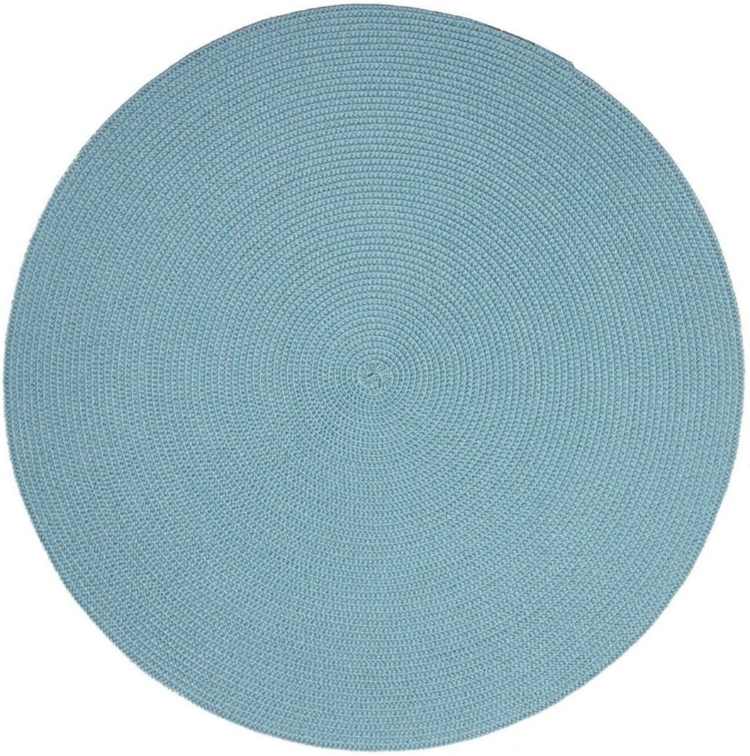 The Deborah Rhodes Linen Braid Placemat Set features round, flat, light blue woven placemats with a textured spiral pattern—durable and ideal for bridal registries.