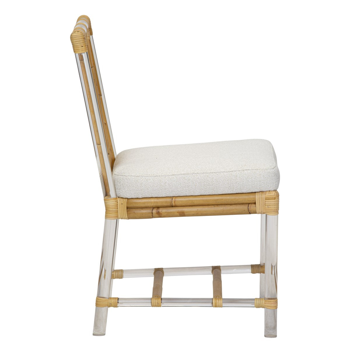 Side view of a Selamat acrylic and rattan side chair with a white cushion.