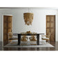 Modern dining room with a large wooden table, eclectic chandelier, and Selamat Acrylic and Rattan Side Chairs.