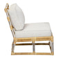 A side view of the Sea Cliff Slipper Chair by Selamat, featuring a cushioned chair with a bamboo frame and white seat and back cushions. The chair showcases a low profile, minimalist design with rattan hand-bent accents inspired by the Sea Cliff aesthetic.