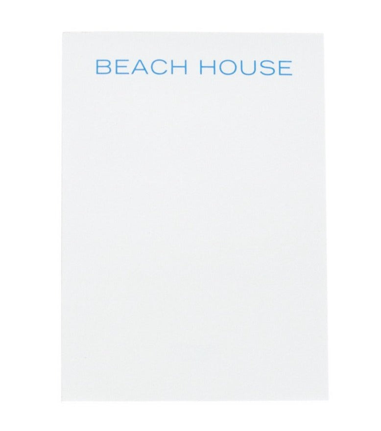 The Printery Beach House Notepad features a bone white pad with "Beach House" text flat printed in blue at the top.