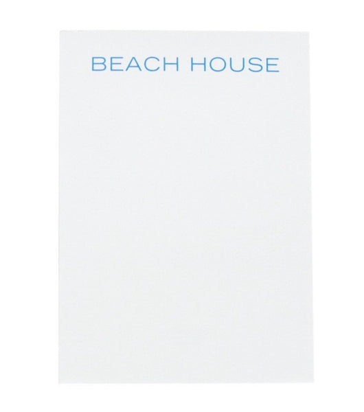 A bone white Printery - Beach House Notepad with the word beach house on it.