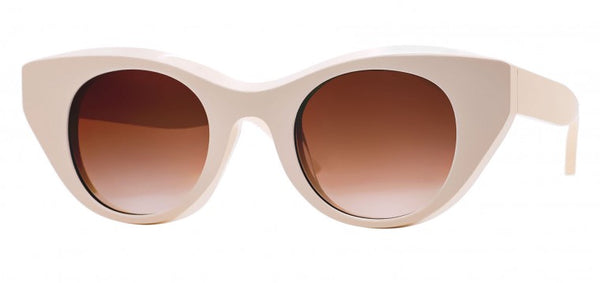 Handmade in Italy, Thierry Lasry Snappy sunglasses with cat-eye frames and brown-tinted lenses on a white background.