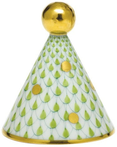 The Herend Party Hat is a conical porcelain piece with hand-painted green scales, gold dots, and accents, finished with a gold sphere—ideal for artistic appreciation.
