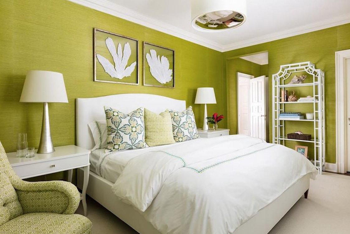 A bedroom with green walls, soft silver silk accents, and overall height created by the Visual Comfort Reflection Large Hanging Shade in Soft Silver.