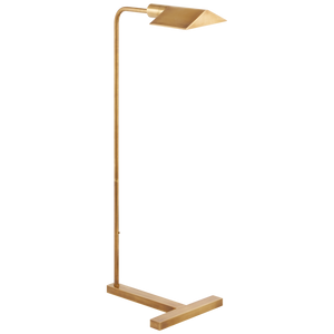 The William Pharmacy Floor Lamp by Visual Comfort is a modern piece featuring a minimalist design with a square-shaped shade and an antique brass finish, adding timeless elegance.
